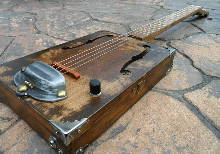 Re-finished plain wood box guitar